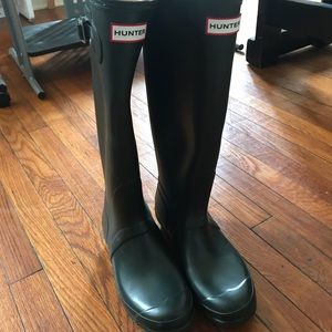 Dark green hunter boots